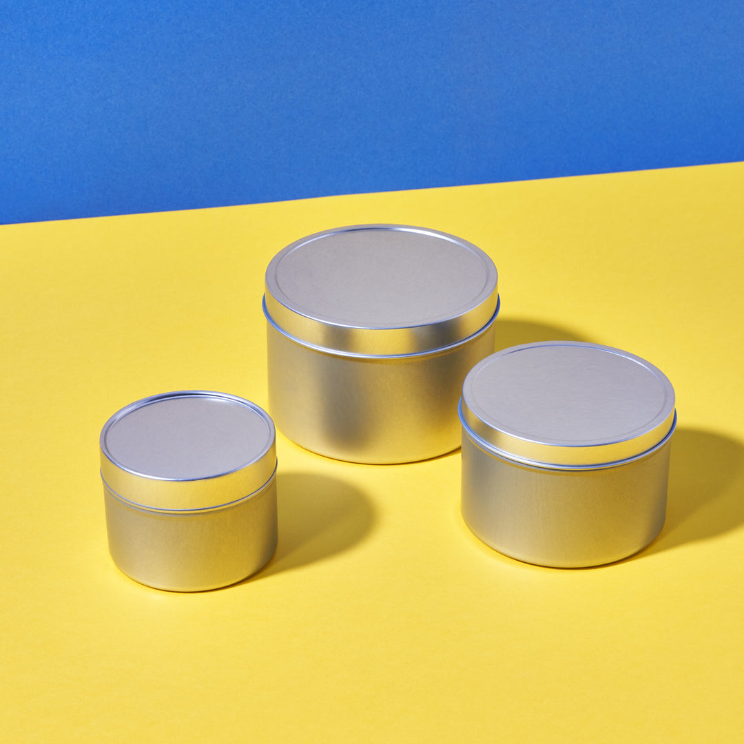 Three Round seamless slip lid tins in silver.
